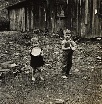 MARION POST WOLCOTT (1910-1990) Group of 5 F.S.A. photographs depicting children in West Virginia and Belle Glade, Florida. 1938-40.